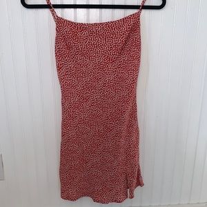 Princess Polly red floral dress accentuates curves